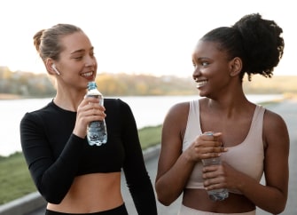 women sportswear taking break from workout
